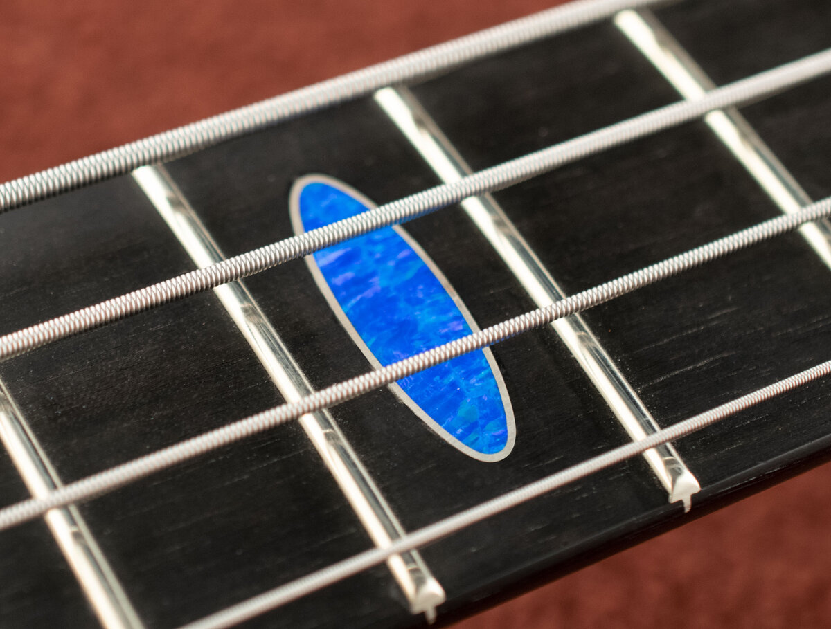 Blue Lab Opal oval inlay wrapped in silver