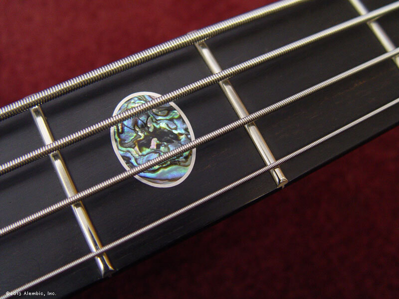 Abalone oval inlay wrapped in silver