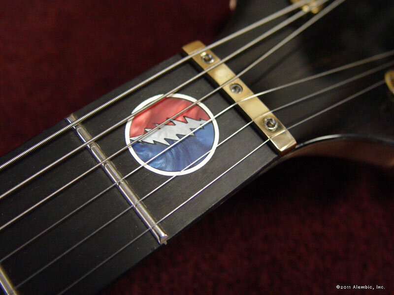 Simple Stealie in mother of pearl, red and blue pearloid, and silver