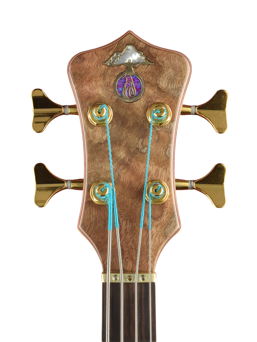 Bronze inlaid logo with mother of pearl and purple lab opal